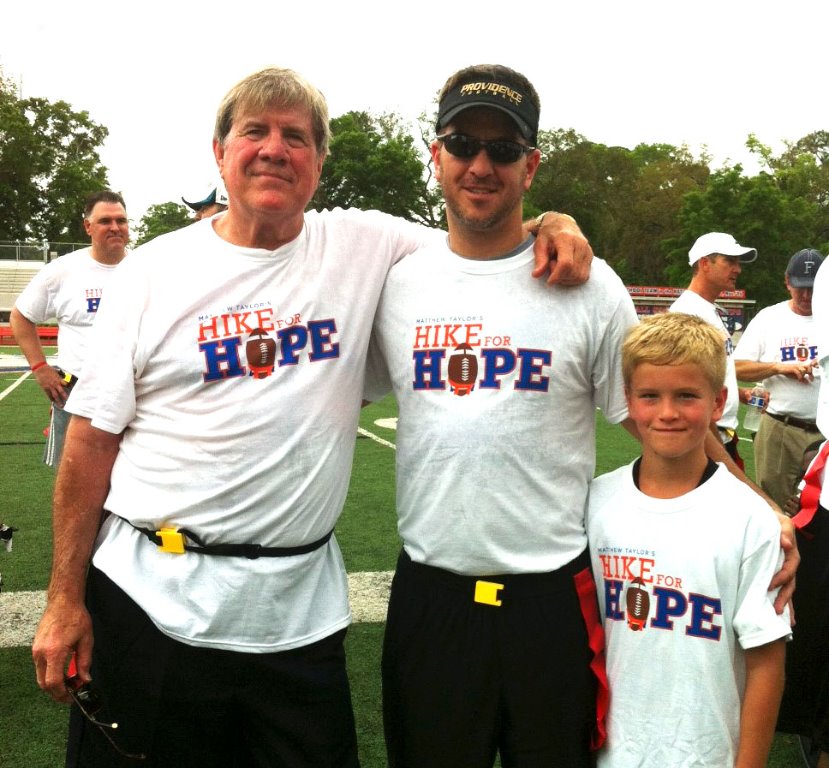 Harmon Wages, son Travis and grandson Eli